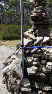 10m squid pole attached to the rock cairn